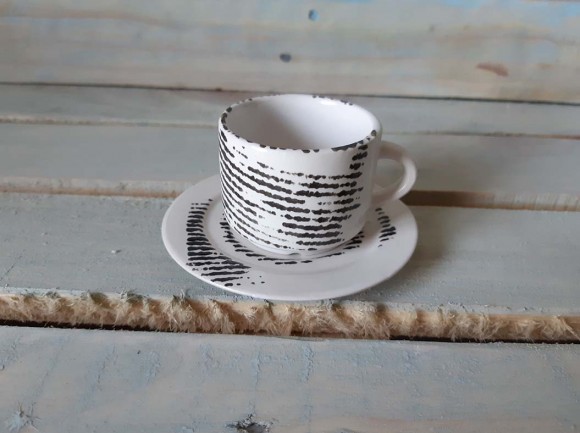 Чашка di caffe espresso с блюдцем